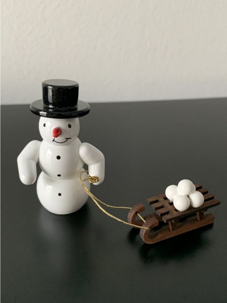 Schneemann mit Schlitten Dekofigur aus Holz 5,5cm